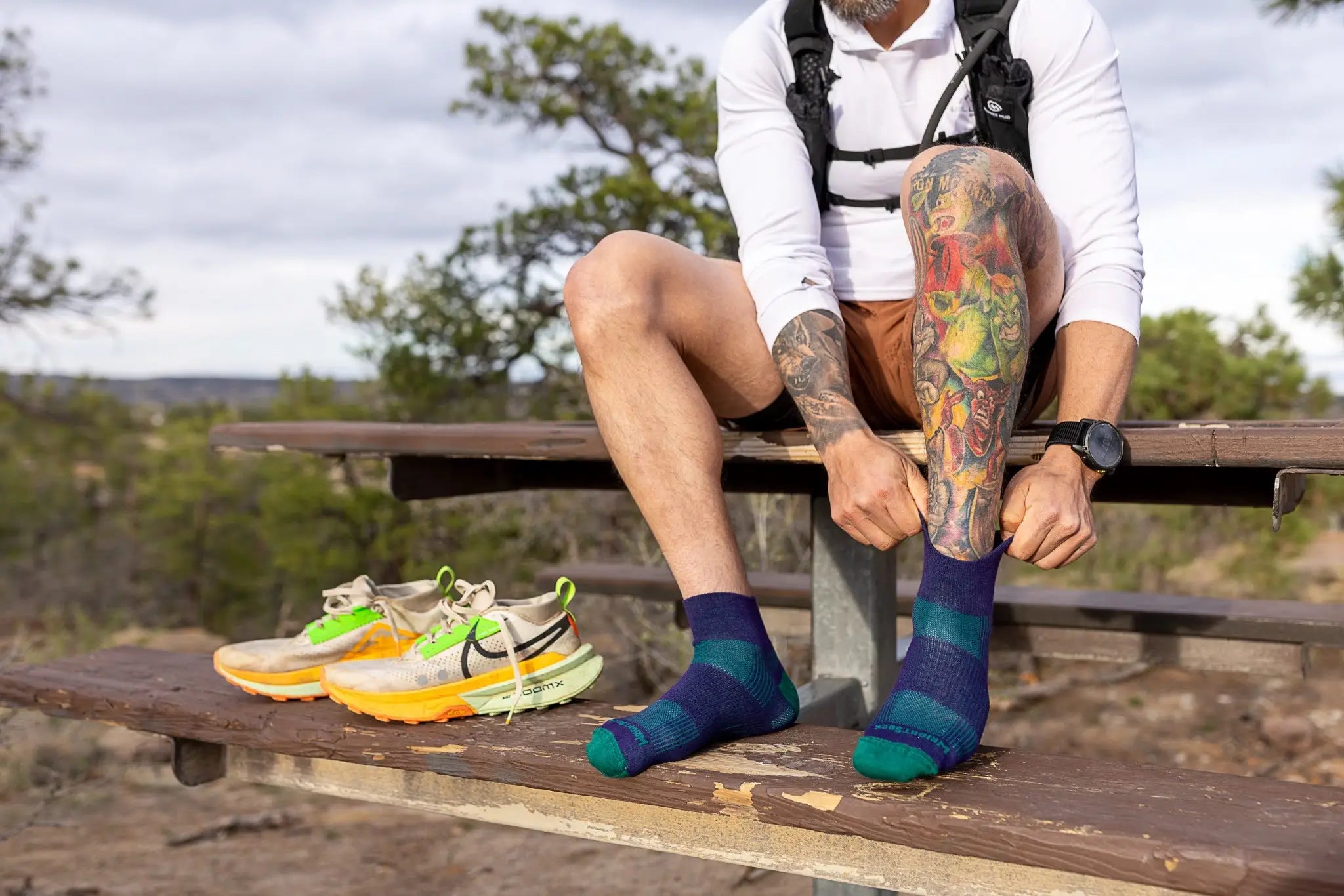 Trail runner wearing Wrightsock Double Layer anti-blister socks